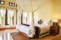 Cozy canopy bed in bedroom