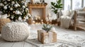 Cozy Christmas Interior. A warm and cozy living room with Christmas decor, a tree, and a gift in front of a fireplace. Royalty Free Stock Photo
