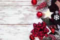 Cozy Christmas or winter side border over a rustic white wood background Royalty Free Stock Photo