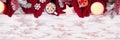 Cozy Christmas or winter top border over a white wood banner background Royalty Free Stock Photo