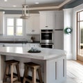 A cozy, coastal beach house kitchen with white cabinets, a farmhouse sink, and nautical accents2