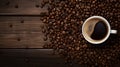 Cozy Coffee Scene: Top View of Coffee Cup and Beans on Vintage Kitchen Table with Space for Text Royalty Free Stock Photo