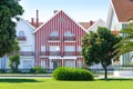 Cozy colorful striped house with red and white stripes in countryside Royalty Free Stock Photo