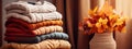 Cozy comfort fashion wardrobe Autumn 2023, What To Wear This Fall. Pile of autumn colors warm knitwear sweater, knitted clothes