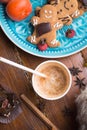 Cozy composition with coffe and cookies at wooden table. life style concept. flat lay. close up