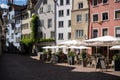 Cozy corner of cafes with tourist sights in Grisons Chur City, Switzerland