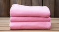Cozy Cottagecore: Stacked Pink Fleece Blankets On Wooden Board