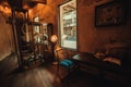 Cozy dark rooms of asian hotel artifacts, wooden furniture, old decorations