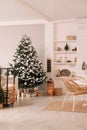 Cozy dining room interior with Christmas tree and festive decor Royalty Free Stock Photo