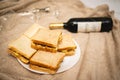 A cozy dinner. Elegant wine and sandwiches, toasts. A romantic evening for two. Royalty Free Stock Photo