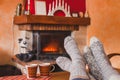 Cozy family evening at home near fireplace in winter