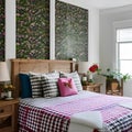 3 A cozy, farmhouse-style bedroom with a mix of floral and gingham bedding, a white wooden bed frame, and a large, vintage-inspi