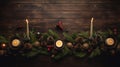 a cozy and festive Christmas table decoration featuring lit candles, pine cones, and ornaments against a dark wooden background Royalty Free Stock Photo