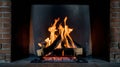 Cozy Burning Fireplace With Logs and Orange Flames in a Brick Hearth Royalty Free Stock Photo