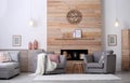 Cozy furnished apartment with niche in wooden wall Royalty Free Stock Photo