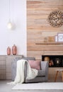Cozy furnished apartment with niche in wooden wall Royalty Free Stock Photo