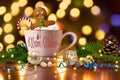 Cozy gingerbread man soaking in cup of hot cocoa with marshmallow