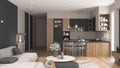 Cozy gray and wooden living room and kitchen in modern apartment, velvet sofa with table, kitchen with island and dining table,