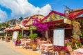 Cozy Greek taverns at Nydri town coastal street Lefkada Greece