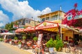 Cozy Greek taverns at Nydri town coastal street Lefkada Greece