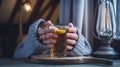 Cozy hands wrapped around a cup of tea with lemon on a cold day Royalty Free Stock Photo