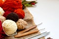 Cozy hobby concept. Crochet, knitting and knitting yarns, knitting needles and crochet hooks