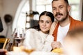 Close-up happy family, married couple celebrate Thanksgiving day, sitting at table with holiday traditional food, dishes Royalty Free Stock Photo