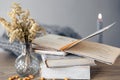 Cozy home composition with books on the table close-up. Royalty Free Stock Photo