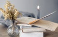 Cozy home composition with books on the table close-up. Royalty Free Stock Photo