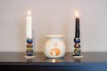 Cozy home interior decor, burning candles. Royalty Free Stock Photo