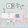 Cozy home interior with house plants, coffee table, chest of drawers, comfort armchair and home decorations. Comfortable interior Royalty Free Stock Photo