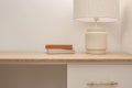 A cozy Home interior in warm beige tones in Japanese and Scandinavian Style. Desk with two notebooks.