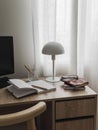 Cozy home office interior - a desk with work, educational supplies. Cozy house concept Royalty Free Stock Photo