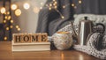 Cozy home setting with tea and lights Royalty Free Stock Photo