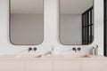 Cozy hotel modern bathroom interior with double sink and long mirror Royalty Free Stock Photo