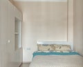 Small beige bedroom with bed and wardrobe