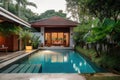 cozy house exterior with swimming pool and lush garden, offering a relaxed and serene atmosphere