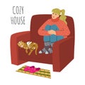 Cozy house. The girl is sitting in a large comfortable chair, legs crossed. Cat is sleeping next to her. Cute flat