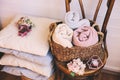 cozy interior details, scandinavian lifestyle. Organizing clothes in wicker baskets Royalty Free Stock Photo
