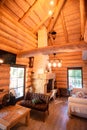 Interior of wood Chalet in mountains with chimney