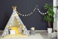 Cozy kids room interior with play tent Royalty Free Stock Photo