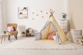 Cozy kids room interior with play tent Royalty Free Stock Photo