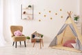 Cozy kids room interior with play tent Royalty Free Stock Photo