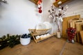 cozy kitchen decorated for Christmas. plate dryer on a wooden work surface...