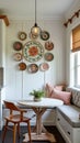 Cozy kitchen nook with decorative plates and round table Royalty Free Stock Photo