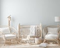 Cozy light blue nursery with natural wooden furniture