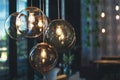 Cozy light bulbs in dark and moody cafe. Royalty Free Stock Photo