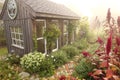 Cozy Little She-Shed and Brick Path in Cottage Garden on Foggy Morning Royalty Free Stock Photo