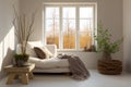 Cozy living room interior with beige sofa, knitted blanket and cushions. Royalty Free Stock Photo