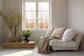 Cozy living room interior with beige sofa, knitted blanket and cushions. Royalty Free Stock Photo
